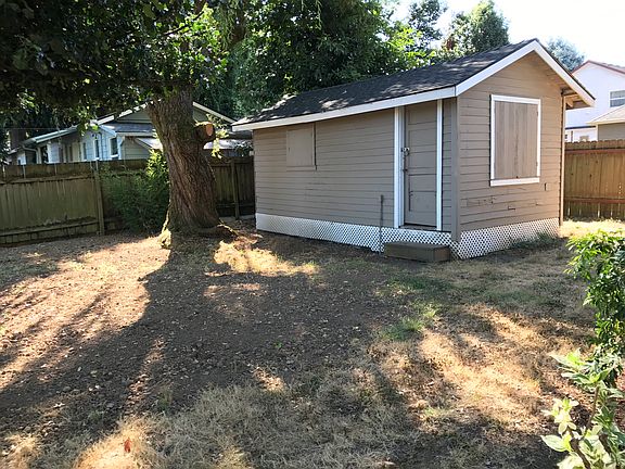 Detached shed in back yard
