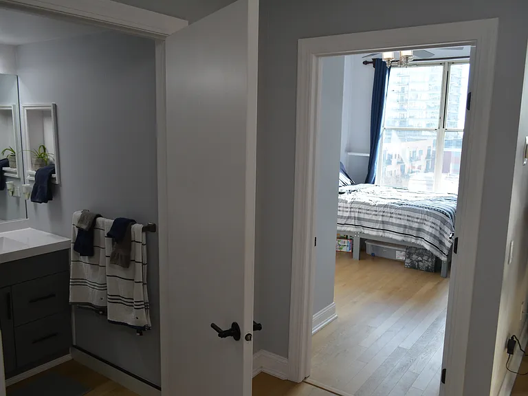 Foyer showing bathroom and bedroom