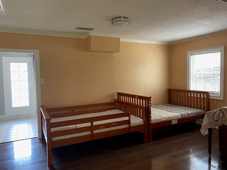 Additional climate-controlled bonus room with air conditioning. Perfect for a home office, study area, playroom, fitness space, or hobby room