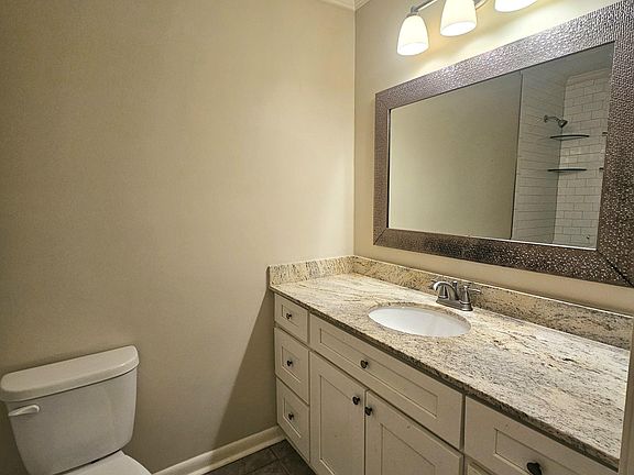 Hall bathroom with tub/shower combo