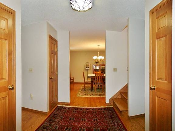 As you enter the home you will be greeted by quality with oak hardwood flooring and solid six panel doors.