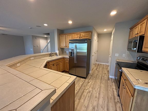 Kitchen (opens to Living Area)
