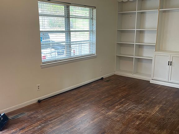 The large front windows let in plenty of light.