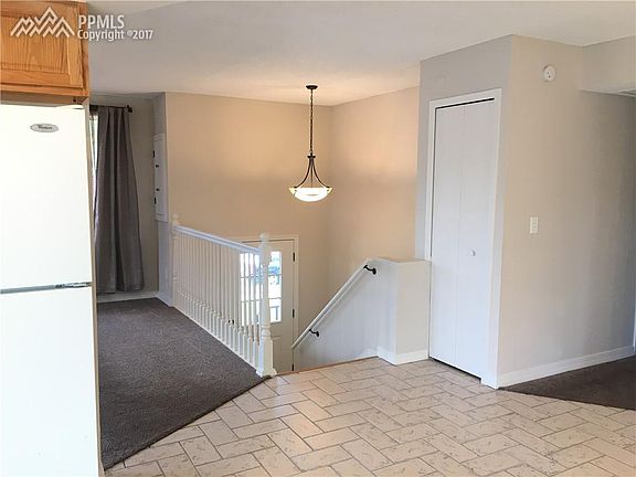 Looking at front door from kitchen.