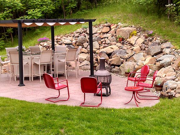 Stone patio with pergula