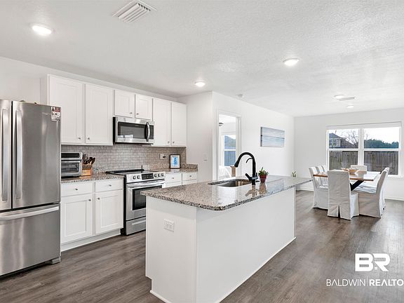 5th image of 10763 Paget Dr N
