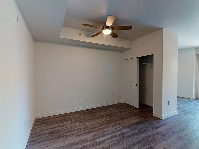 Living room with wood-style flooring.