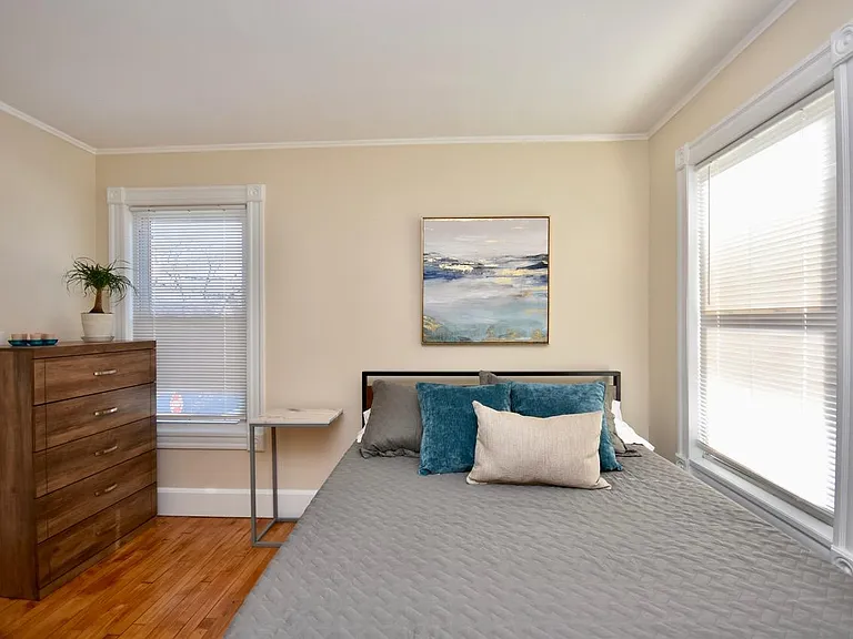 Bedroom with queen bed and 43" Smart TV