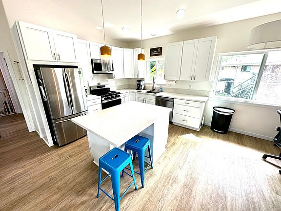 Kitchen with stainless steel appliances