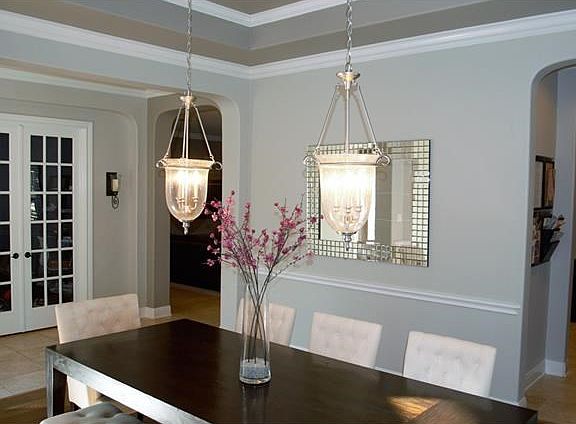 Inviting Formal Dining with High Ceilings!