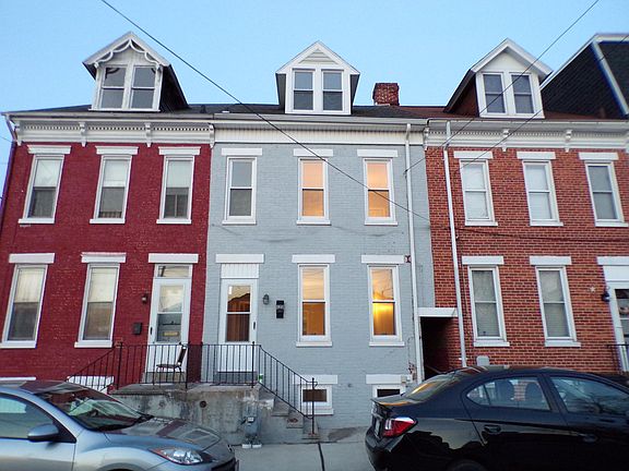 front of townhouse new storm door