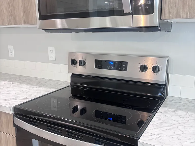 new stove and microwave... new refrigerator will be installed