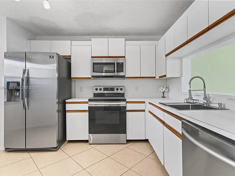 1100 SW 128th Ter #210U — Photo 1