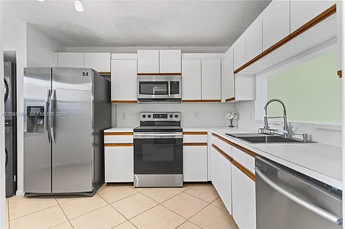 1100 SW 128th Ter #210U Photo 1 1100 SW 128th Ter #210U Photo 1