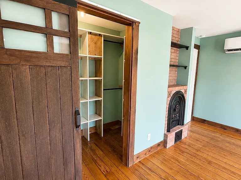 Master walk-in closet with sliding barn door