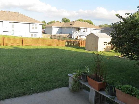 Front porch is covered for guests coming to visit.