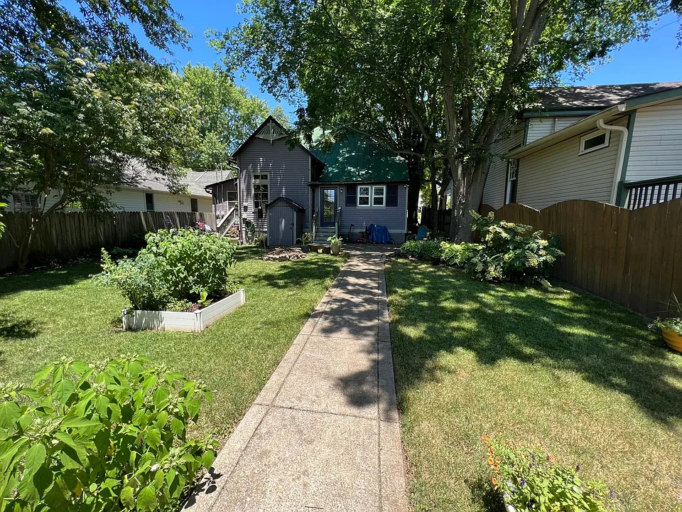 Backyard with entrance to studio.