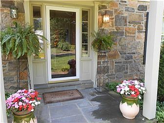 Welcoming Covered Slate Front Entry
