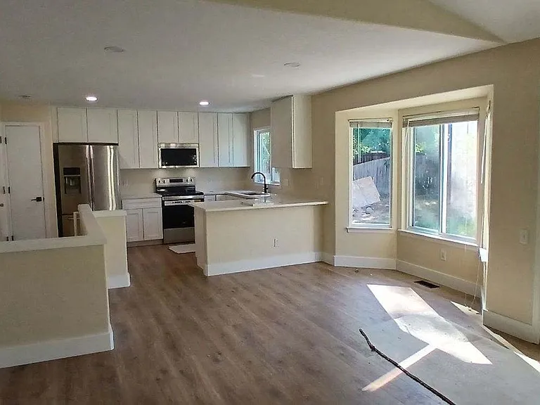Kitchen and door to the patio from the living room.