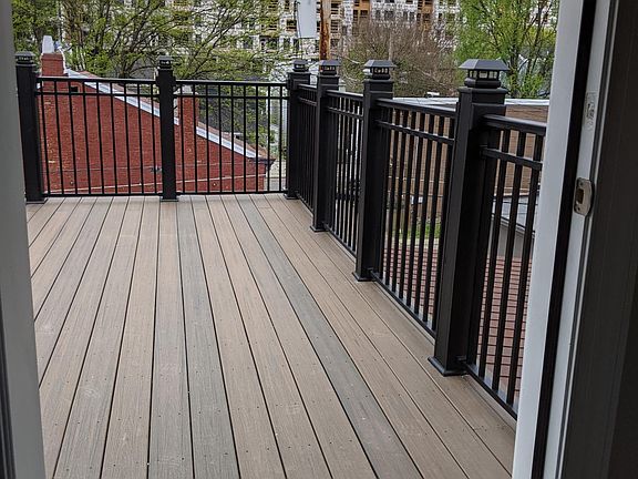 This deck is lovely and spacious. (The construction in the background is nearly complete.)