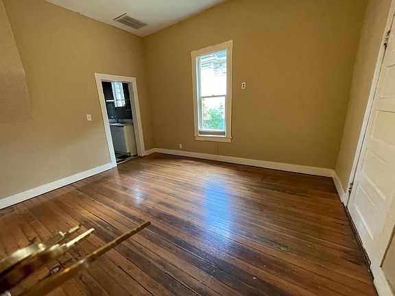Den or office. Laundry and the back door to the backyard is off of this room.