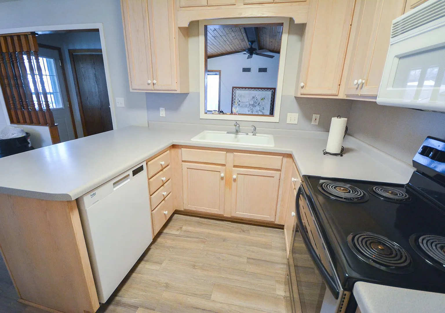 Abundant space & storage throughout this updated 4br home! — Photo 4