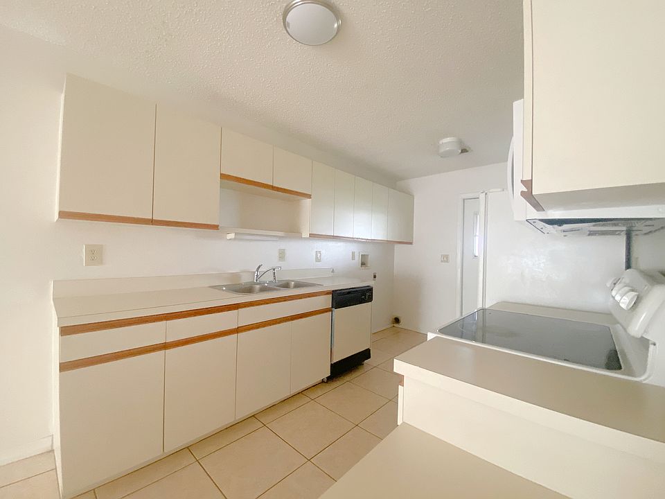 Galley style kitchen with walk in pantry
