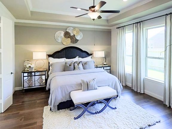 The owner s suite is a private getaway situated in a back corner of the first floor. It features a s