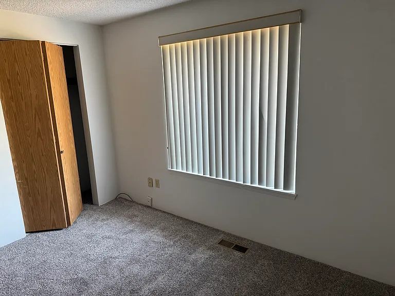 Middle Bedroom with new carpet.
