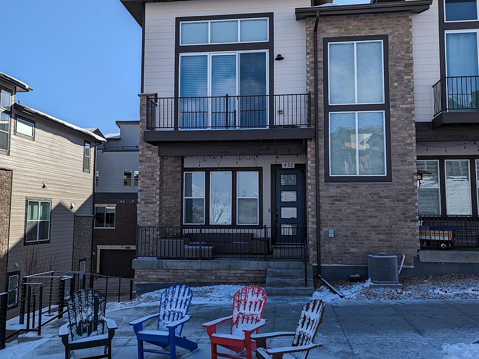End Unit with Private Patio, 2nd Floor Deck and Seating Area in Open Space