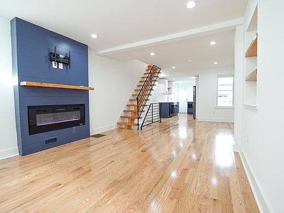 Open concept first floor with living and dining areas