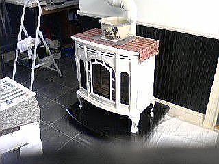 kitchen heat stove on black granite hearth