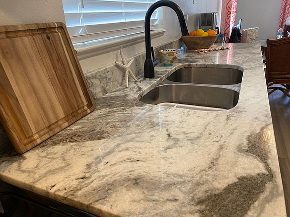 Kitchen - with granite countertops and stainless steel appliances