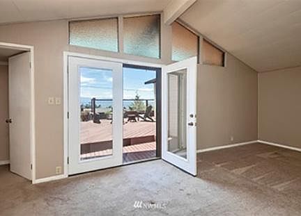 master bedroom leads to wrap around deck