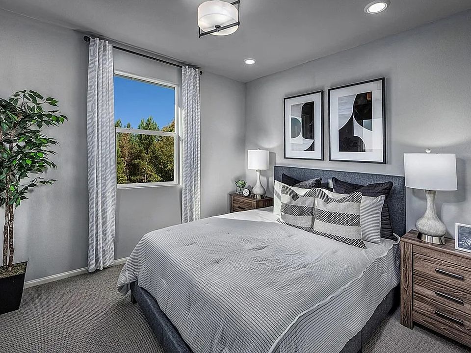 Spacious primary bedroom with ensuite bathroom and walk-in closet