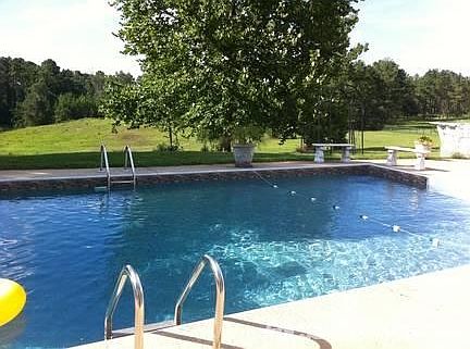 A beautiful slope in the back yard, starts at the pool.