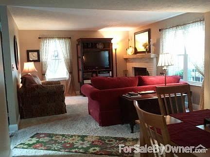 Living Room/Woodburning FP
						:
						Tilt In windows throughout Condo (except Master). Woodburning Fireplace.