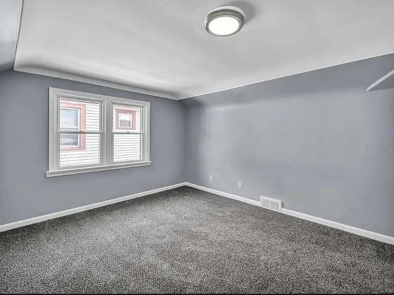 1 of 2 bedrooms upstairs - larger room