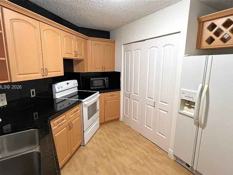 6272 NW 186th St #104 — Photo 6