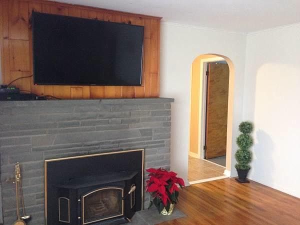 55 Inch TV over mantle