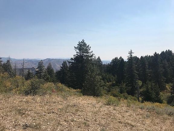 <p>View east from Lot 6 5,500 foot property summit toward the north and Mount Heinen and the Sawtooth Range further northeast.</p>