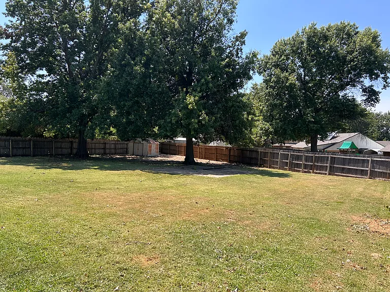 Big Backyard with shade and a storage shed