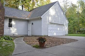 Situated on a sprawling 100 x 184 city lot in the heart of an established neighborhood lined with ma