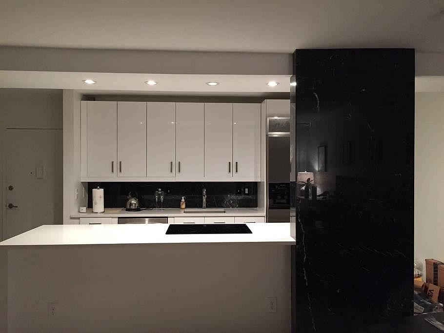 High-end kitchen with induction stove and marble details