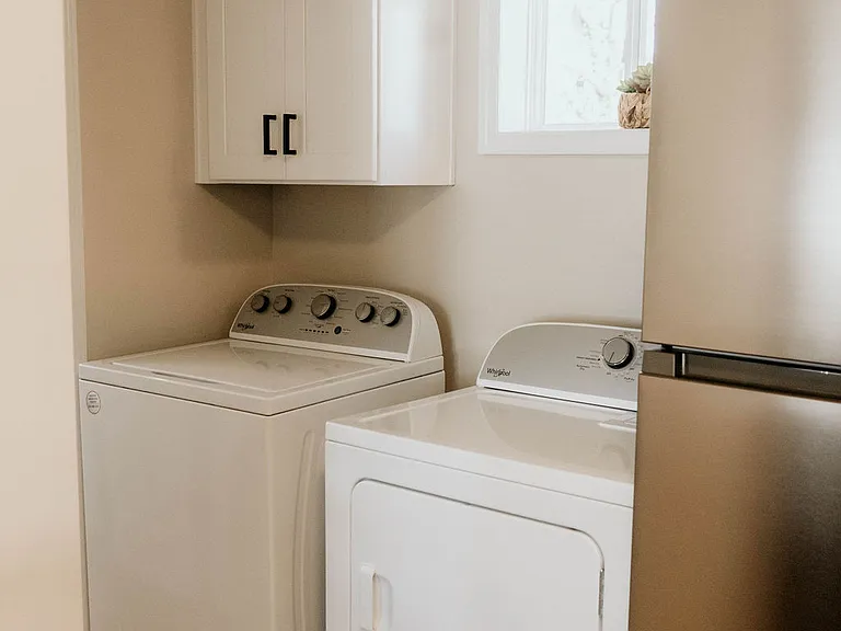 Enjoy the convenience of an in-unit washer and dryer_ideal for long stays and keeping your wardrobe fresh