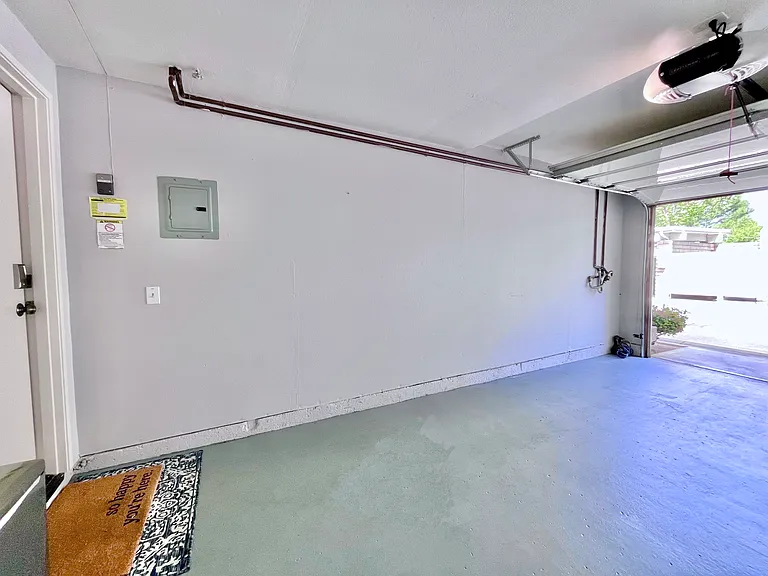 Step free and direct access Attached Garage. Adjacent carport directly across from garage.