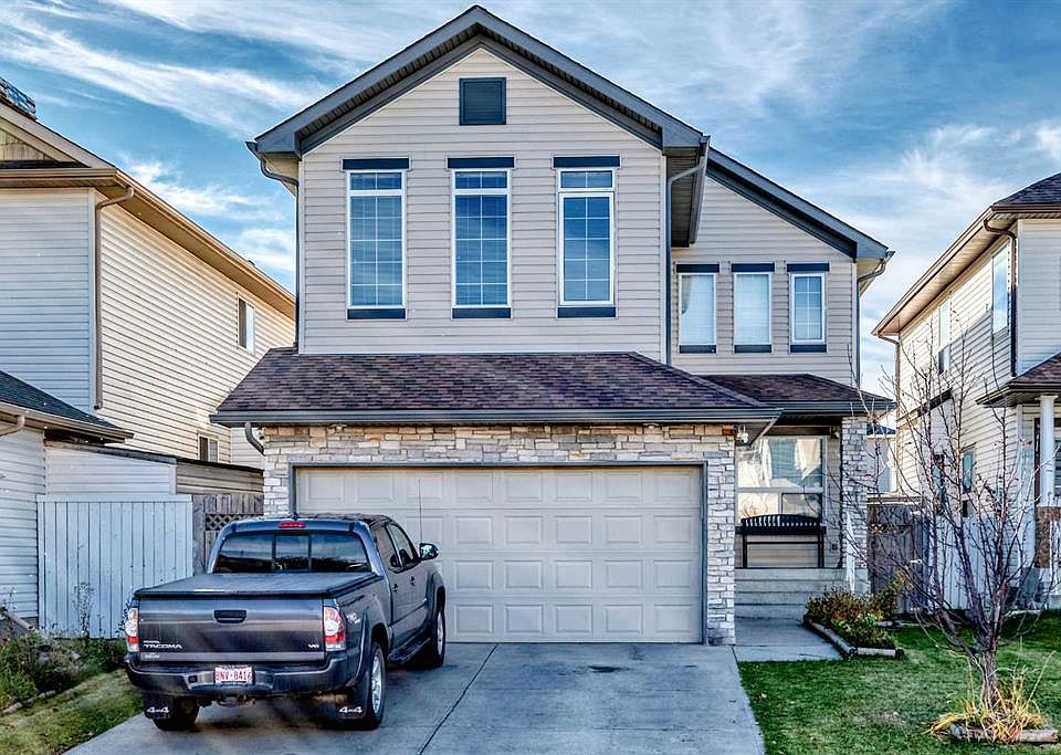 1st image of 222 W Saddlehorn Close NE