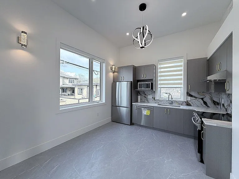 10XX E 62nd Ave — Photo 16