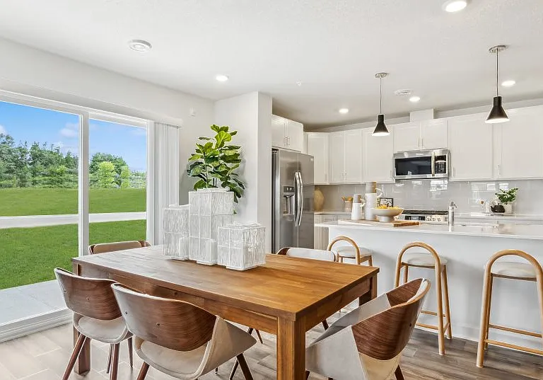 Dining and Kitchen with side porch because of End Unit