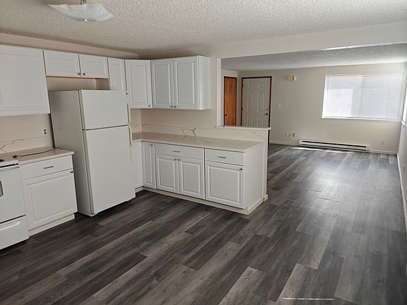 Kitchen connects to main/ living room area